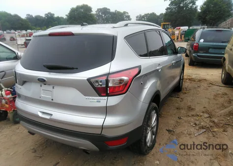 2017 Ford Escape Titanium from USA, damaged, VIN 1FMCU9J9XHUE10243